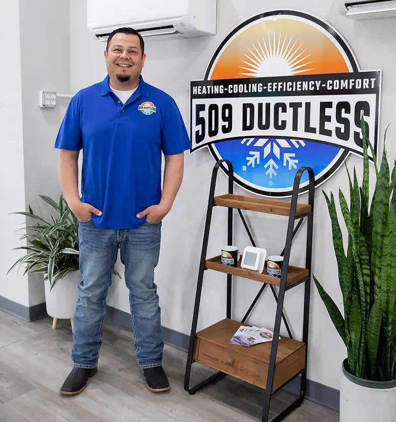 Juvenal, service technician, standing in the 509 Ductless showroom